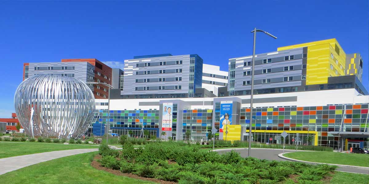 Large colourful buildings of a hospital